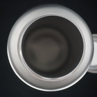 The open mouth from above, the cap beside it