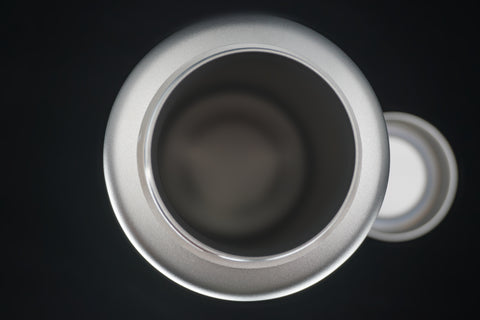 The open mouth from above, the cap beside it
