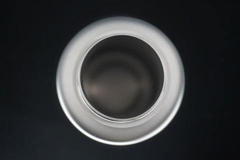 Looking down into the bottle’s wide mouth