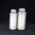 The 1000 ml bottle, right, beside the 700 ml bottle