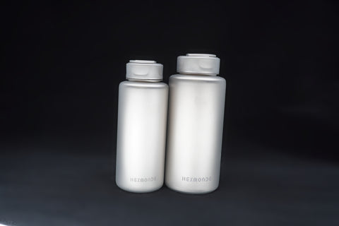 The 1000 ml bottle, right, beside the 700 ml bottle