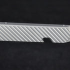 The back of the bit driver, cut with diagonal grooves
