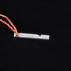 The whistle and lanyard seen from a lower angle