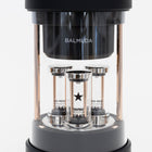 Close-up of the three glass cylinders and the LED-lit star
