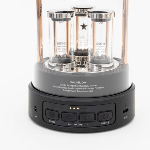 Close-up of the base: power, volume and light buttons