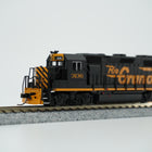 Side view of the black and orange Rio Grande GP40 locomotive on N scale display track.
