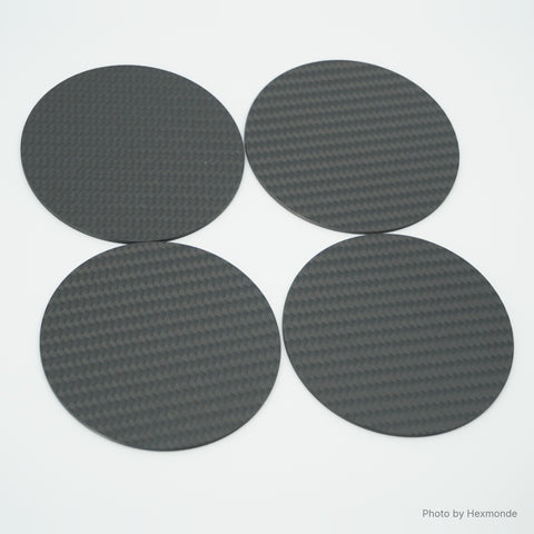Four plain carbon fiber coasters, matte twill weave