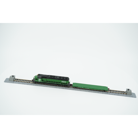 Complete Cascade Green desk train with Burlington Northern SD45, green flat car and both track bumpers.