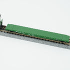 Close view of the green Burlington Northern flat car and its deck on display track.