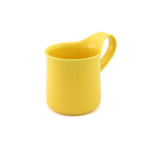 Yellow ceramic mug, handle to the right